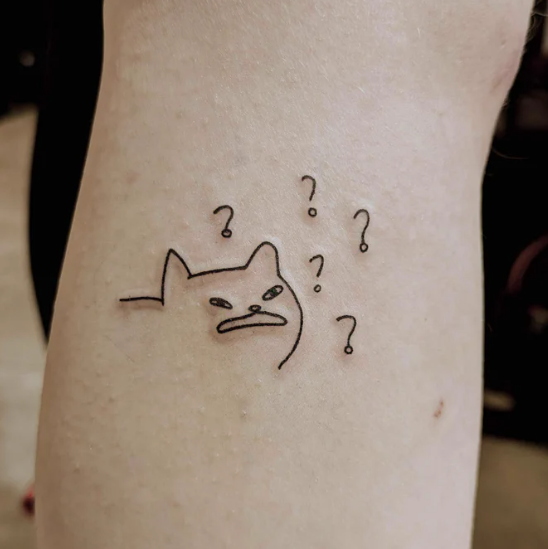 Tattoo of a poorly drawn image